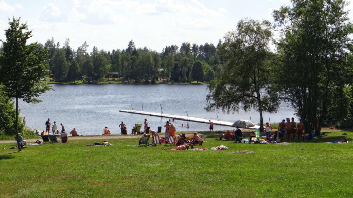 Värnamo in Småland: the bathing place Hjortsjöbadet on Lake Helgasjön in Rydaholm, near the Riksväg 27 national road